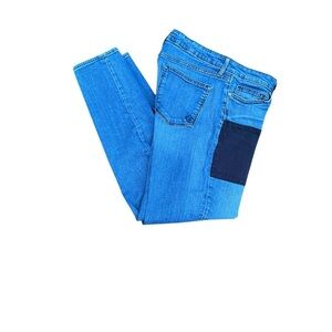 Women Blue Jeans with designer, black frontal patch by Cookie Johnson size 31